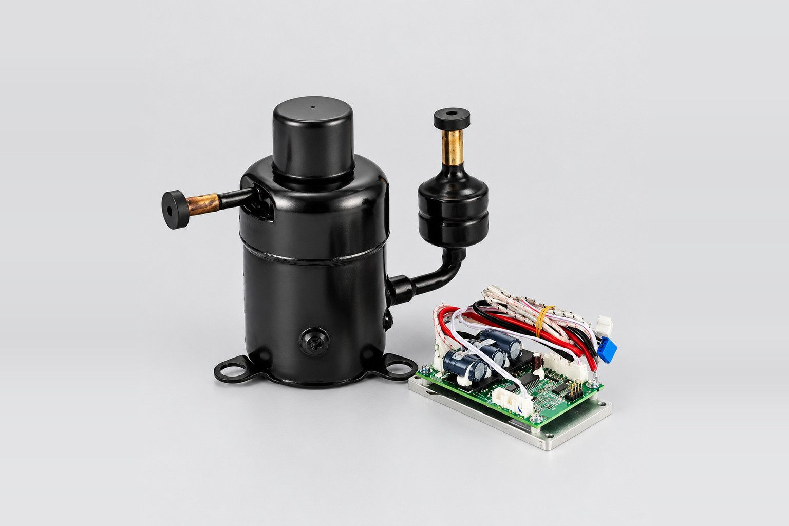 Miniature DC compressor with driver board for variable speed freezer operation