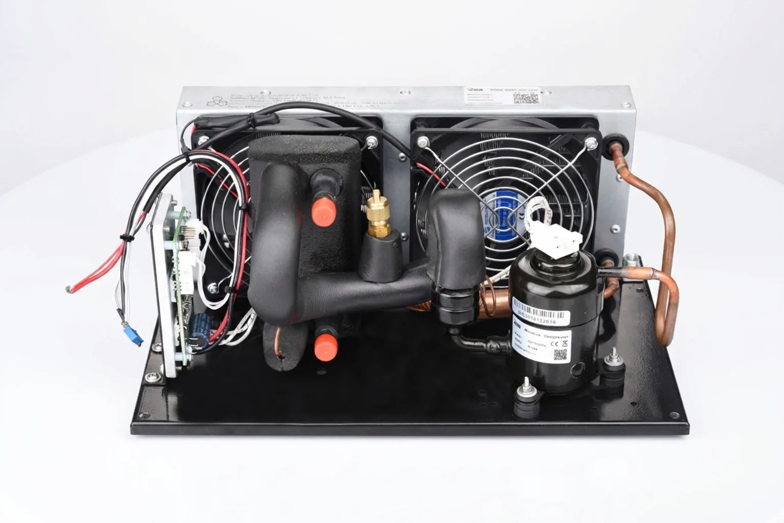 Compact plate-type liquid chiller module showing heat exchanger and connections