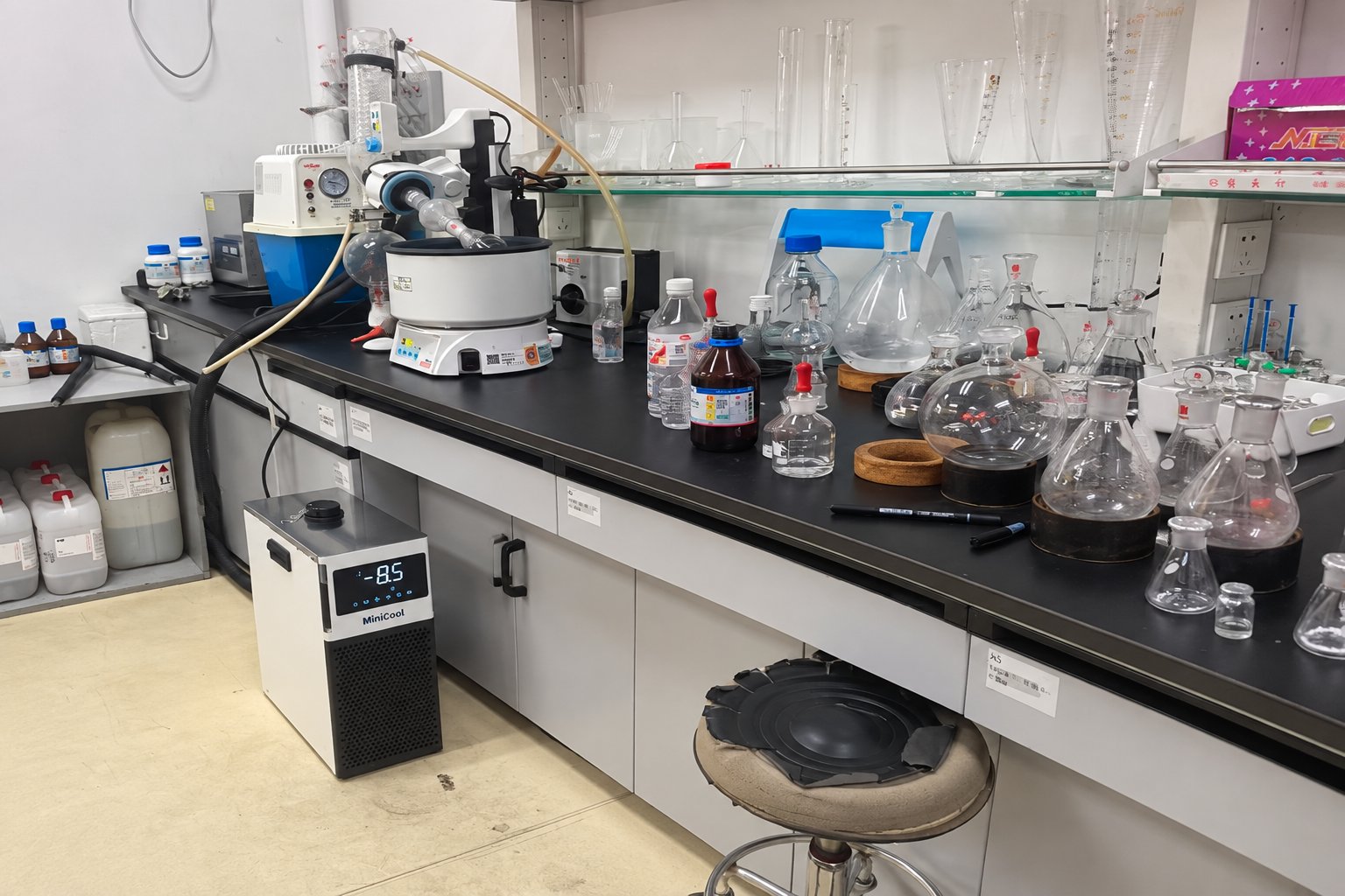 MiniCool recirculating chiller showing a sub-zero reading beside a chemistry lab bench