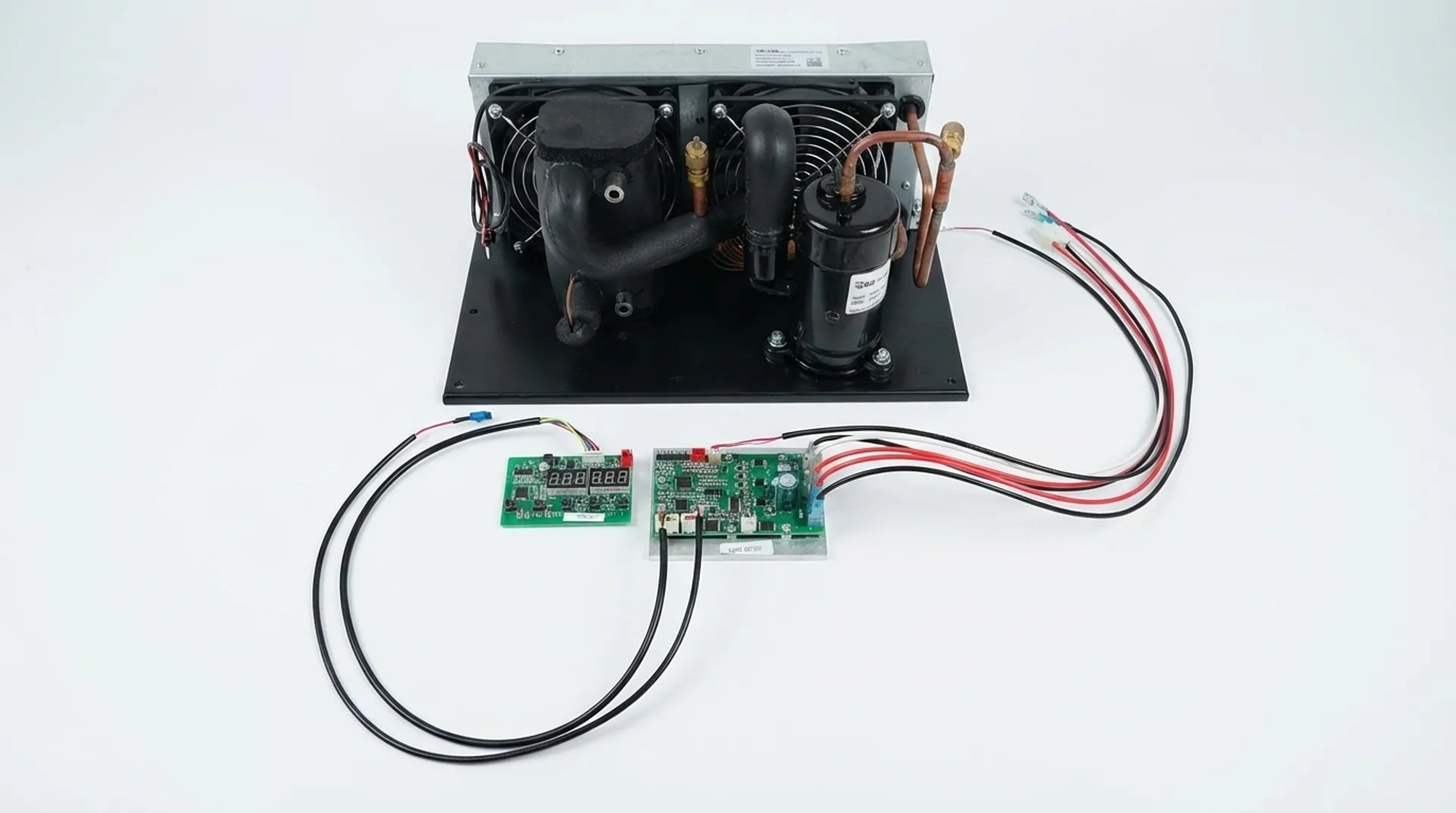 Compact water chiller with plate heat exchanger showing refrigeration components