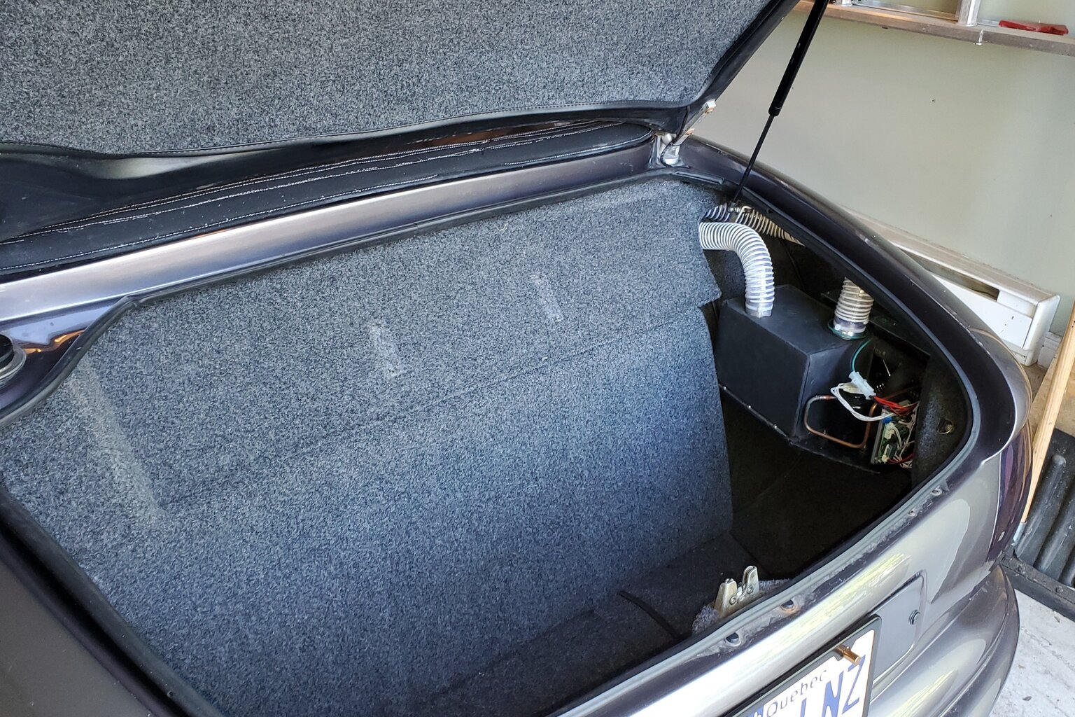 DC aircon system installed in vehicle showing direct battery connection without inverter