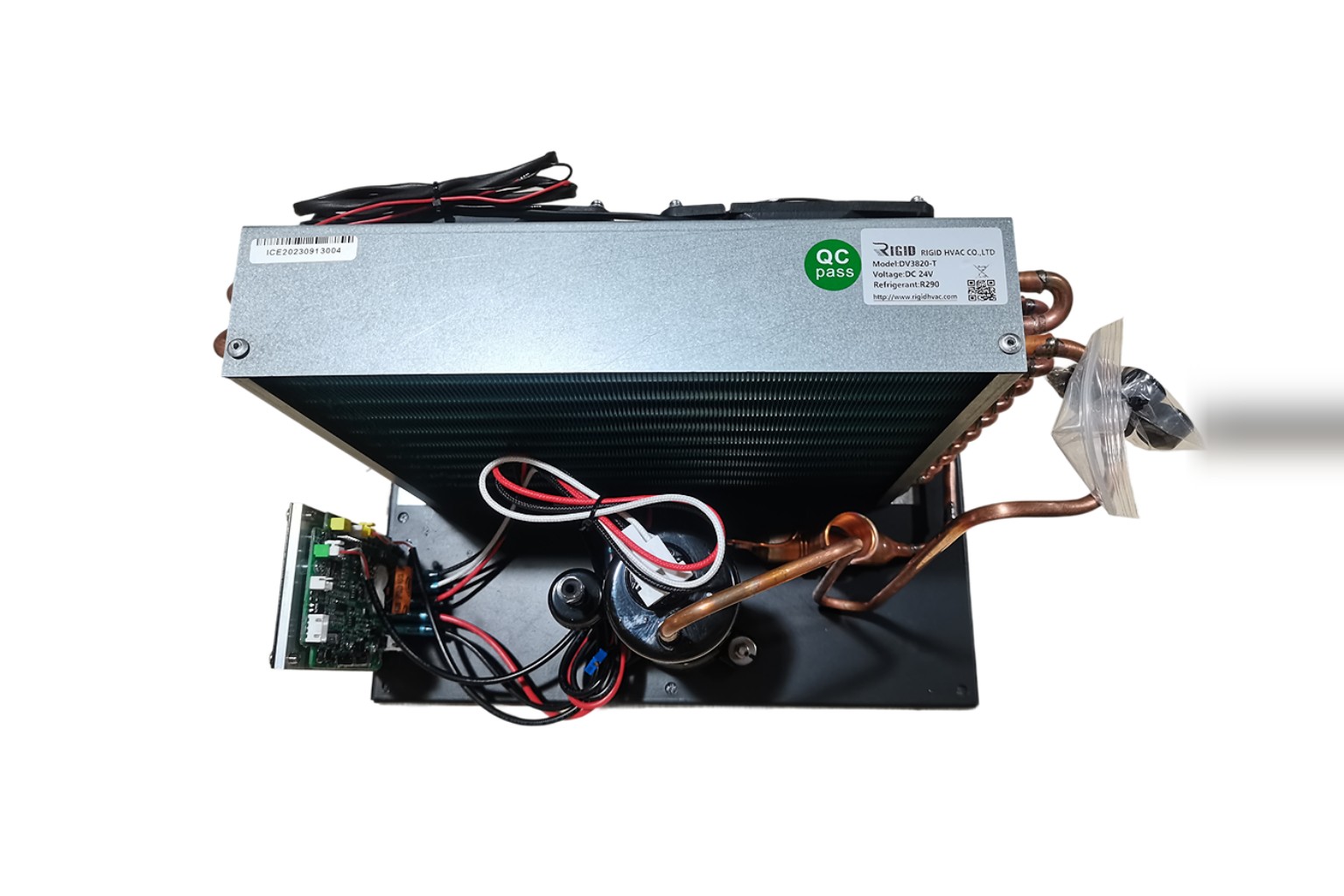 Compact DC condensing unit with condenser coil, fan and miniature compressor