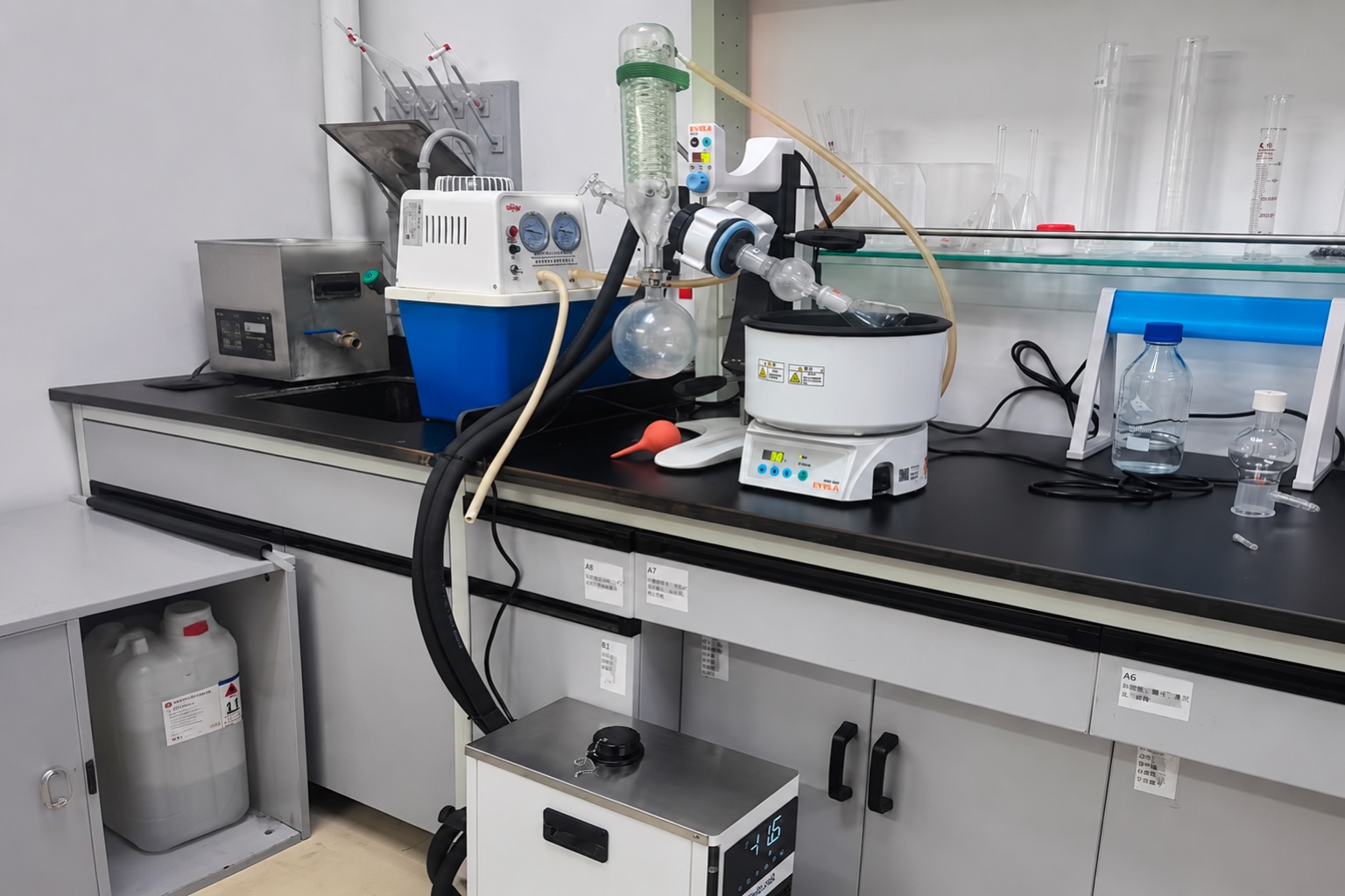 MiniCool sub-zero recirculating chiller supplying a benchtop laboratory instrument stage