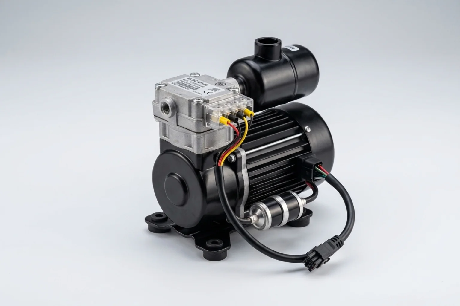Mini AC compressor size comparison showing compact BLDC compressor next to standard components
