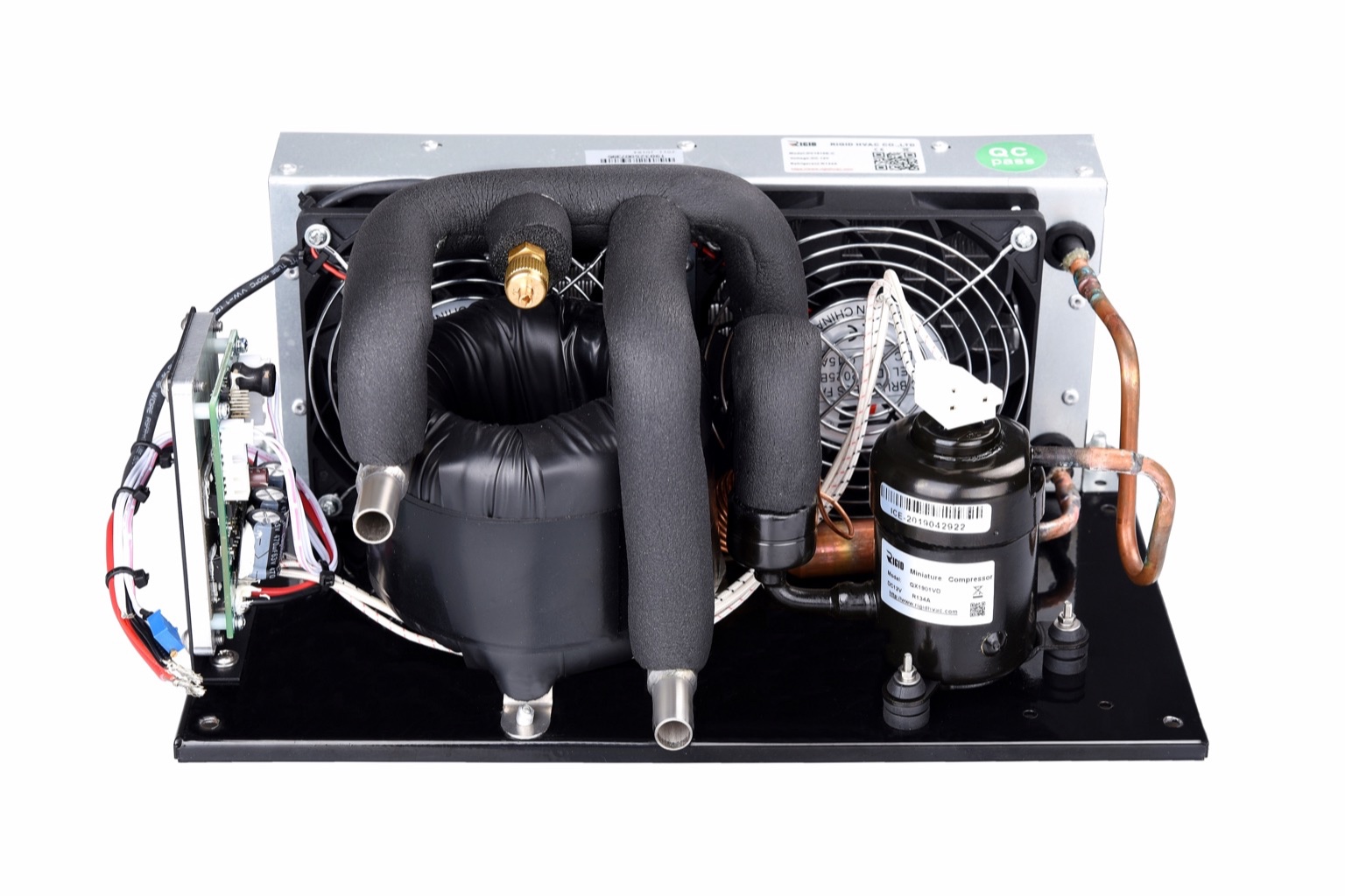 Benchtop water chiller with quick-connect supply and return ports beside analytical laboratory equipment