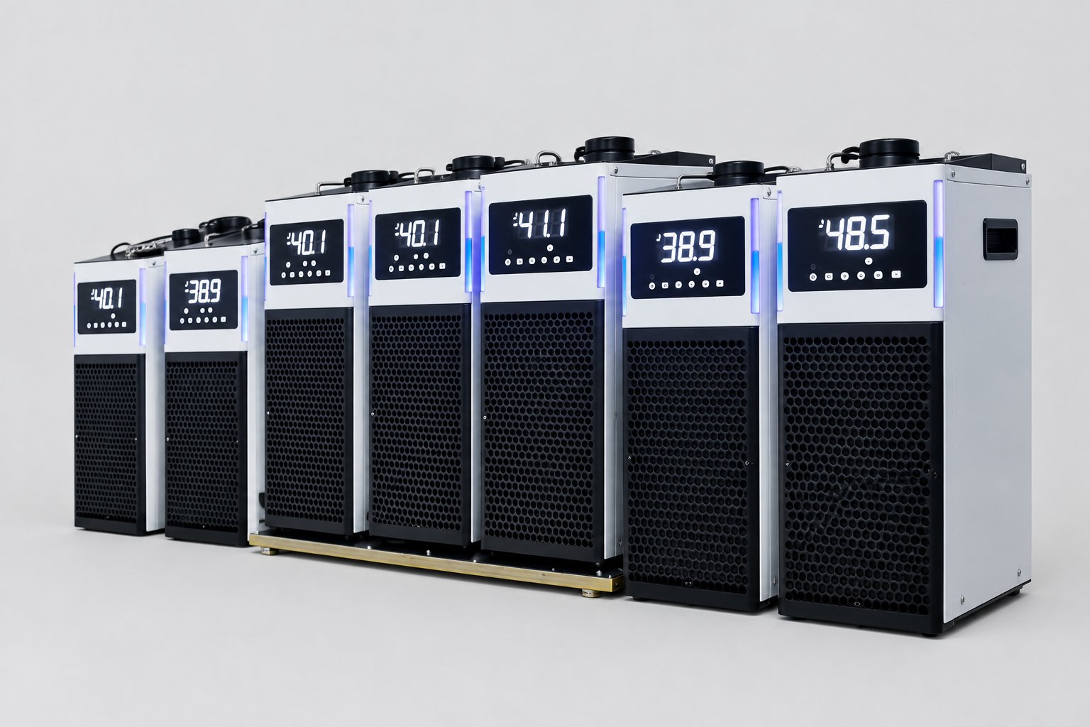 Row of seven MiniCool recirculating chillers with front temperature displays lit