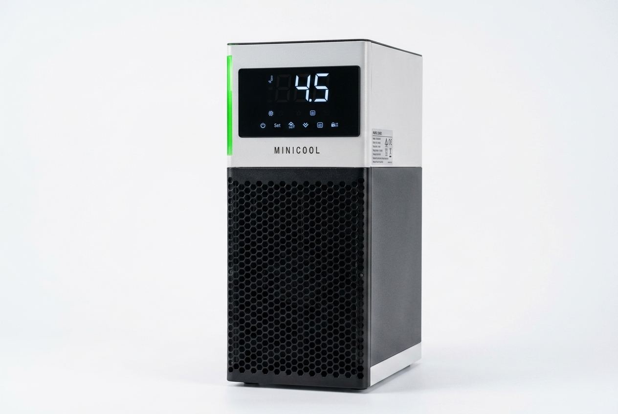 Compact countertop recirculating chiller installed on laboratory bench next to analytical instrument